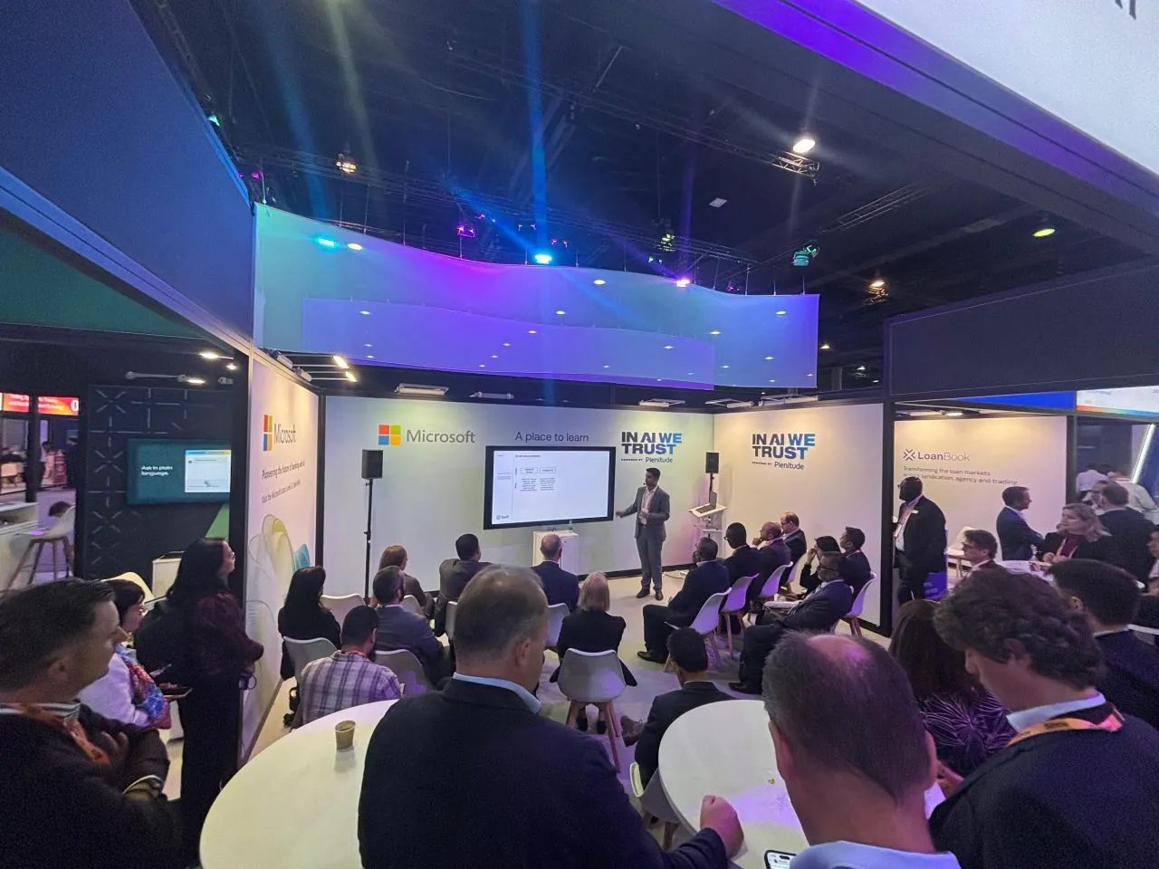 The AI Pavilion stage at Sibos 2025 in Frankfurt, with an audience seated in front of a presentation screen